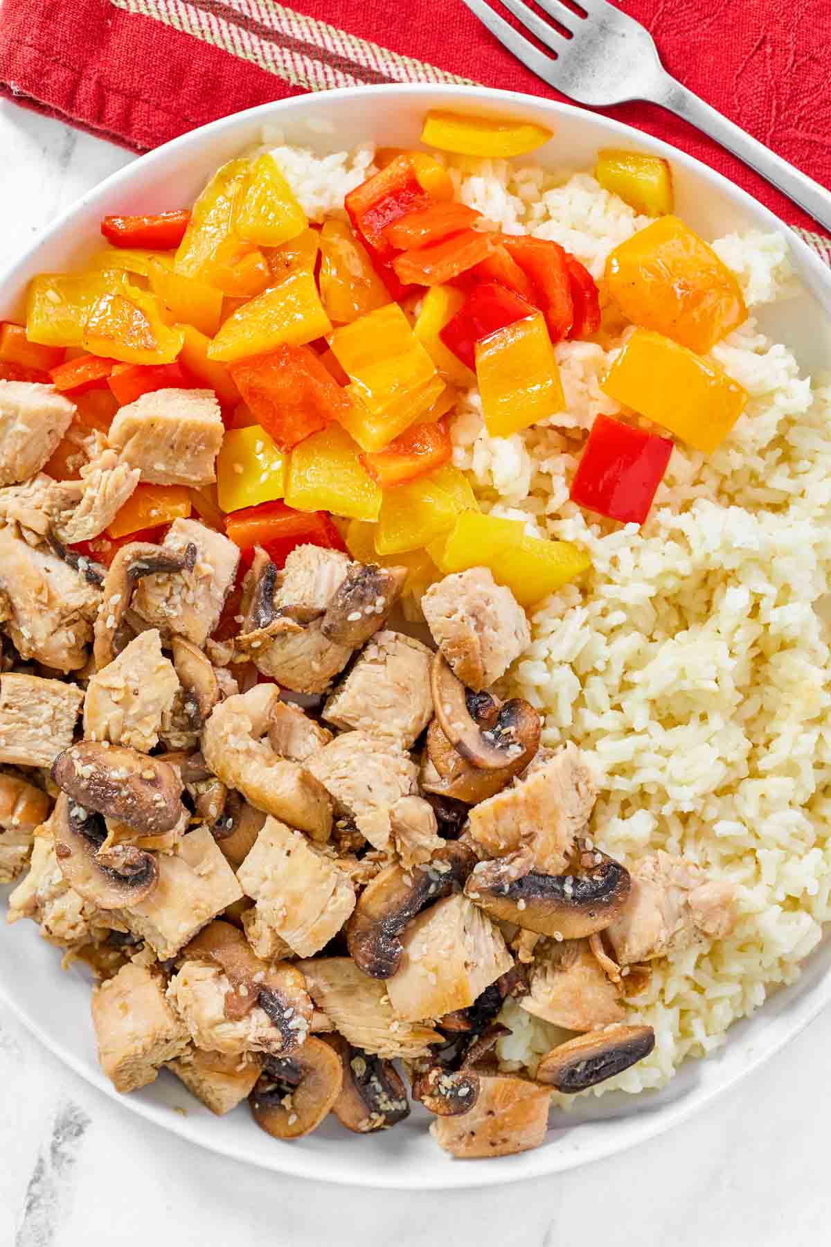Japanese hibachi-style chicken served with rice and vegetables.